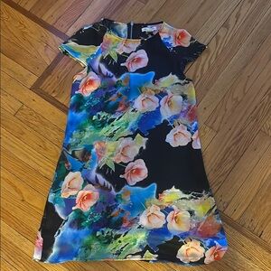 Glamorous Black Dress with Floral and Blue Accents